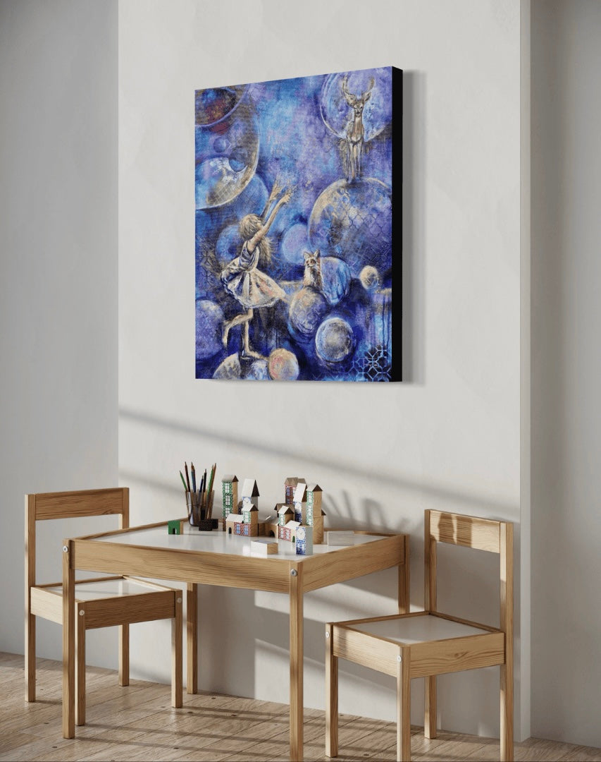 A piece of artwork featuring a whimsical scene with a young girl, a deer, and a fox among floating bubbles against a blue background. The painting is featured in a kids playroom above a kids table and cairs and drawing materials.